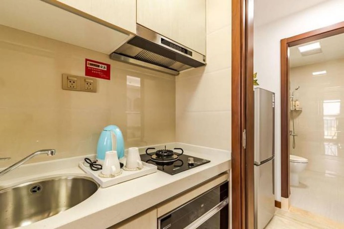 Imagen de la habitación del Hotel Western Theme Holiday Apartment. Foto 18