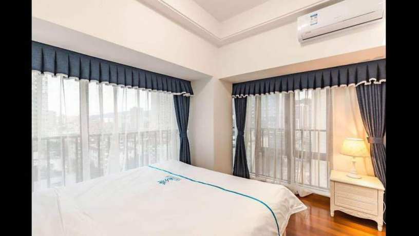 Imagen de la habitación del Hotel Western Theme Holiday Apartment. Foto 19