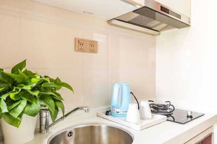 Imagen de la habitación del Hotel Western Theme Holiday Apartment. Foto 20