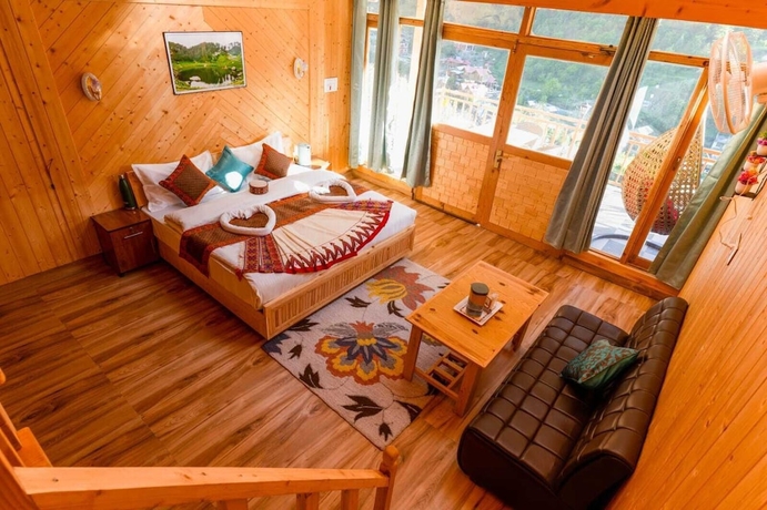 Imagen de la habitación del Hotel Western Tragopan Cottage. Foto 4