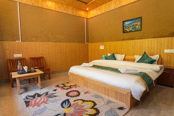 Imagen de la habitación del Hotel Western Tragopan Cottage. Foto 6