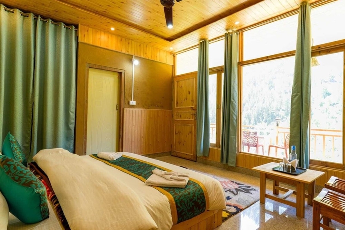Imagen de la habitación del Hotel Western Tragopan Cottage. Foto 7