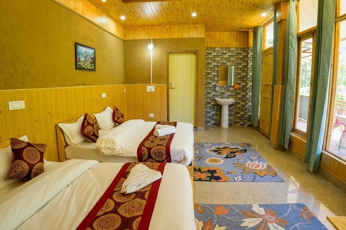 Imagen de la habitación del Hotel Western Tragopan Cottage. Foto 8