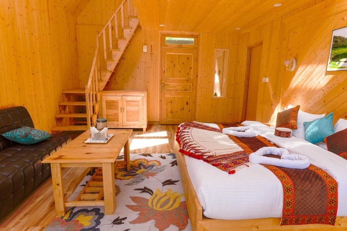 Imagen de la habitación del Hotel Western Tragopan Cottage. Foto 9