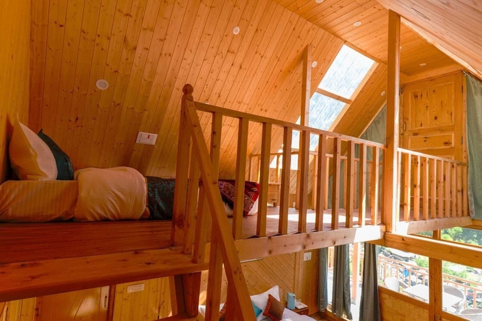 Imagen de la habitación del Hotel Western Tragopan Cottage. Foto 10