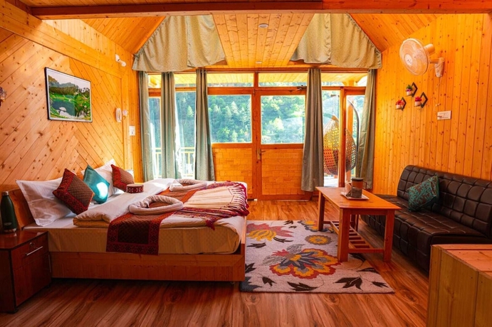Imagen de la habitación del Hotel Western Tragopan Cottage. Foto 11