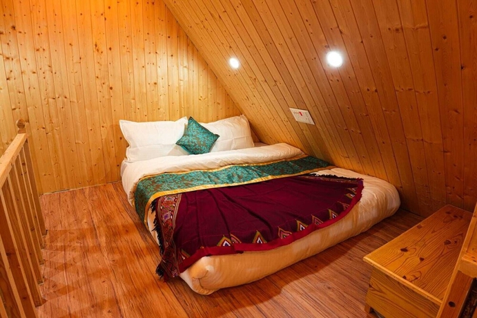 Imagen de la habitación del Hotel Western Tragopan Cottage. Foto 12