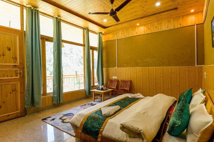 Imagen de la habitación del Hotel Western Tragopan Cottage. Foto 13