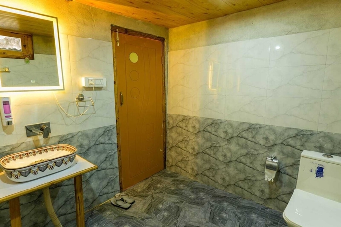 Imagen de la habitación del Hotel Western Tragopan Cottage. Foto 16