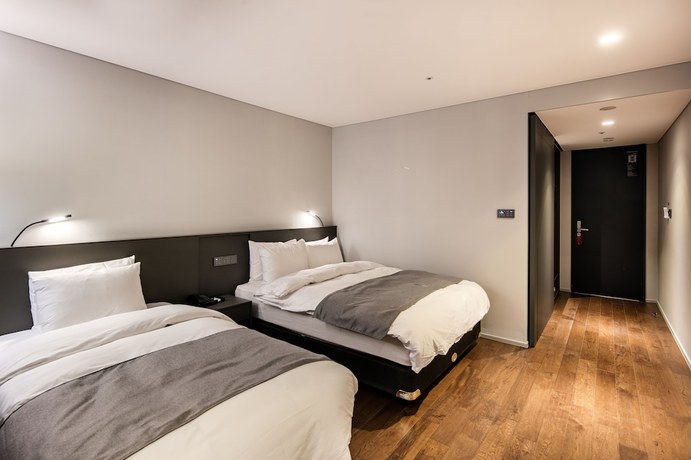 Imagen de la habitación del Hotel Westernlife. Foto 13