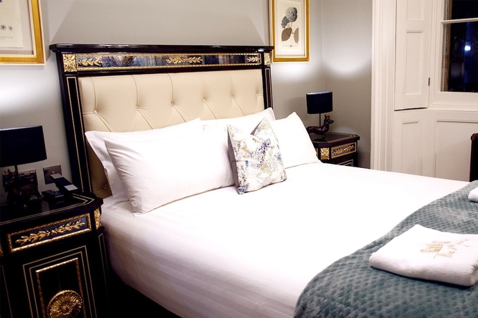 Imagen de la habitación del Hotel Weston Manor. Foto 9