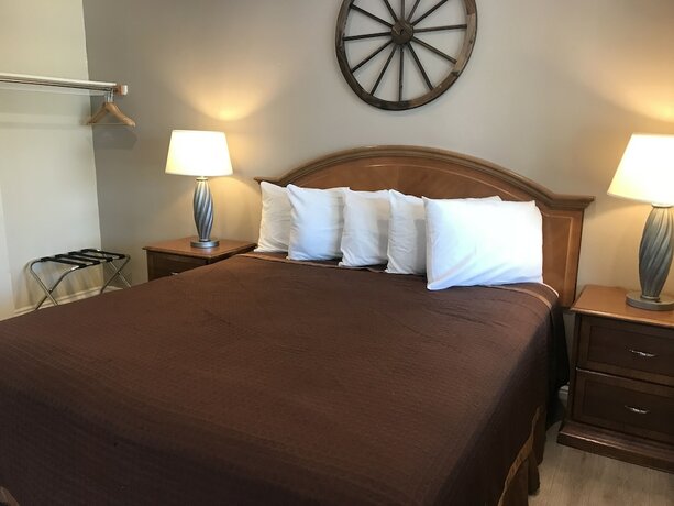 Imagen de la habitación del Hotel Westward Wagon Inn Theme Park Entrance. Foto 1