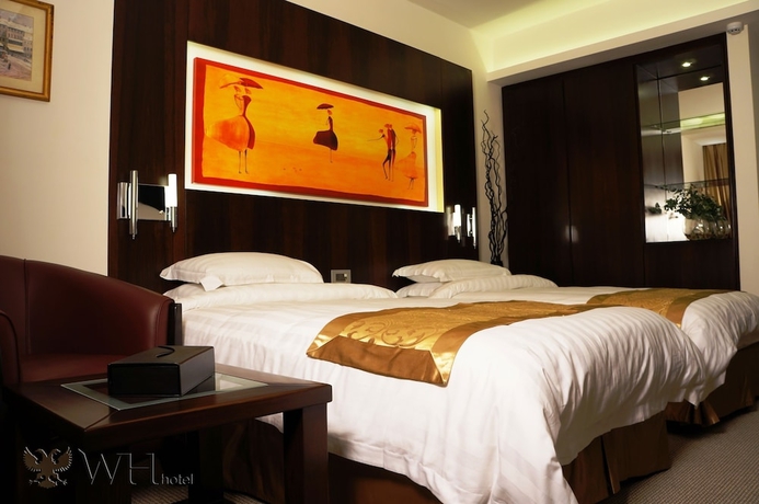 Imagen de la habitación del Hotel Wh. Foto 3