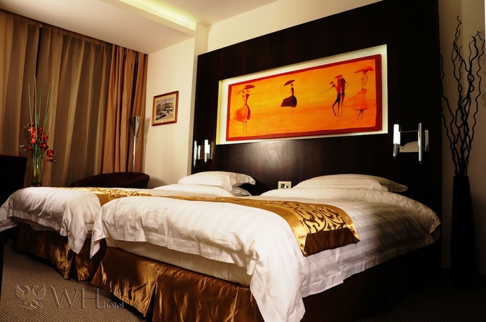 Imagen de la habitación del Hotel Wh. Foto 8