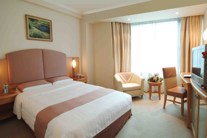 Imagen de la habitación del Hotel Wharney. Foto 8