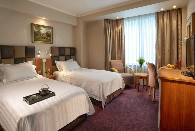 Imagen de la habitación del Hotel Wharney. Foto 11