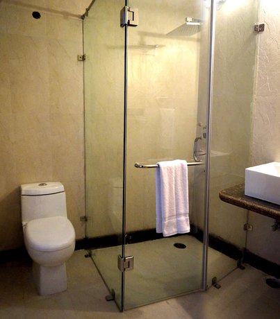 Imagen de la habitación del Hotel Whispering Inn by Vivaan. Foto 11