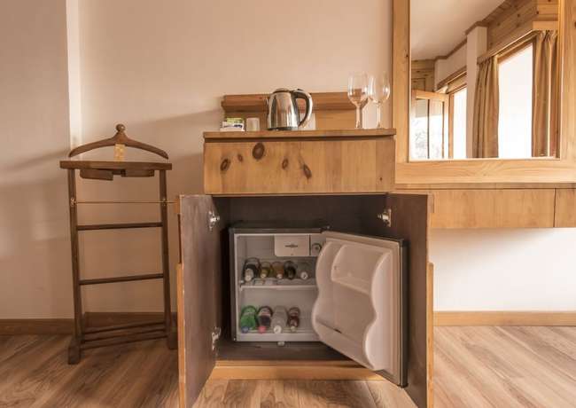 Imagen de la habitación del Hotel Whispering Inn by Vivaan. Foto 12