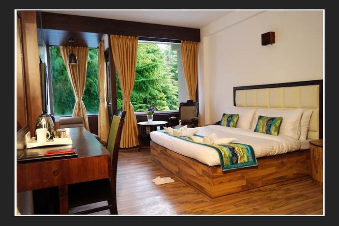 Imagen de la habitación del Hotel Whispering Inn by Vivaan. Foto 16