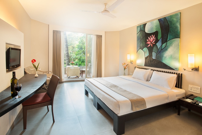 Imagen de la habitación del Hotel Whispering Palms Beach Resort. Foto 8