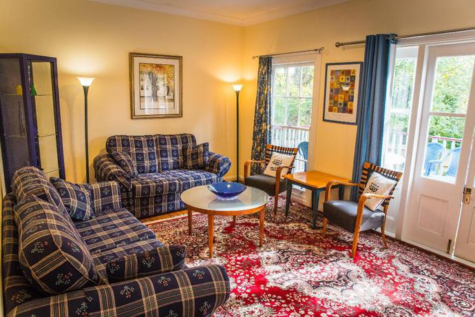 Imagen general del Hotel Whispering Pines Chalet and Cottages. Foto 5