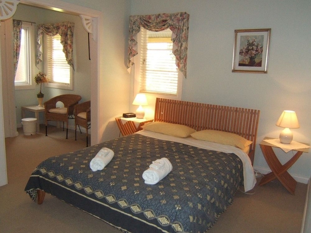 Imagen de la habitación del Hotel Whispering Pines Cottages. Foto 4