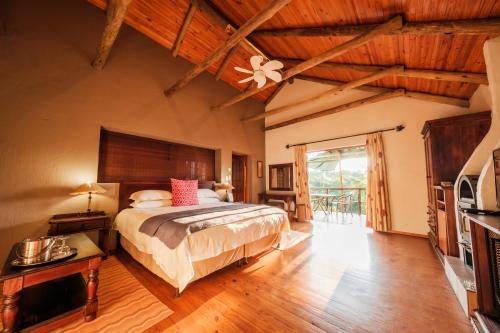 Imagen de la habitación del Hotel Whispering Pines Country Estate. Foto 9