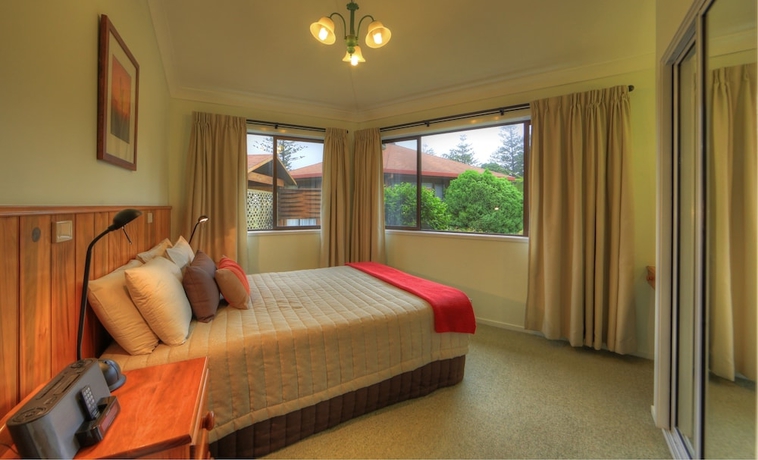 Imagen de la habitación del Hotel Whispering Pines. Foto 17