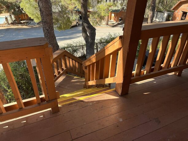 Imagen de la habitación del Hotel Whispering Pines Lodge. Foto 16