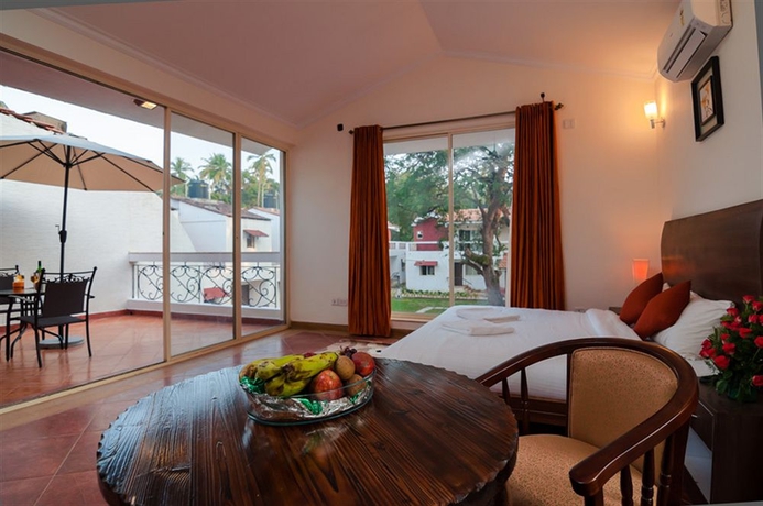 Imagen de la habitación del Hotel Whispering Woods. Foto 3