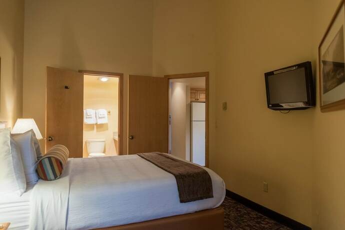 Imagen de la habitación del Hotel Whispering Woods Resort by VRI Americas. Foto 11