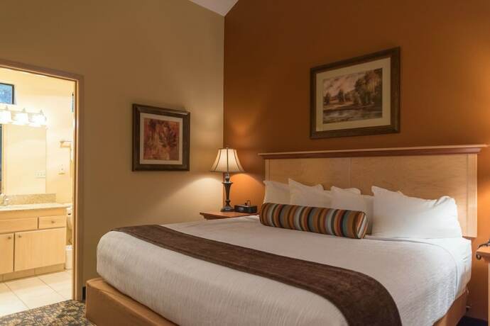 Imagen de la habitación del Hotel Whispering Woods Resort by VRI Americas. Foto 13