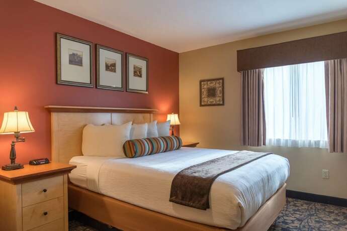 Imagen de la habitación del Hotel Whispering Woods Resort by VRI Americas. Foto 19