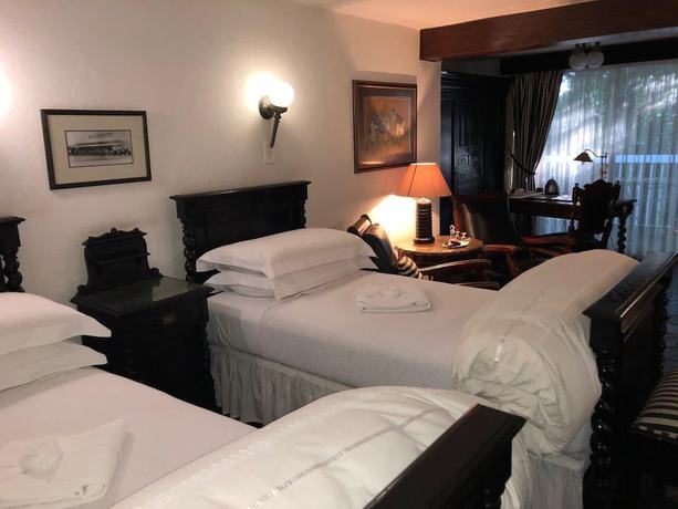 Imagen de la habitación del Hotel Whistletree Manor Boutique. Foto 4