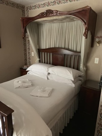 Imagen de la habitación del Hotel Whistletree Manor Boutique. Foto 8