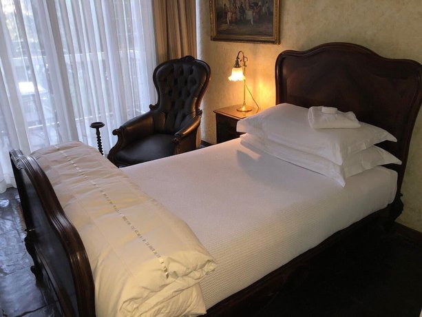 Imagen de la habitación del Hotel Whistletree Manor Boutique. Foto 14