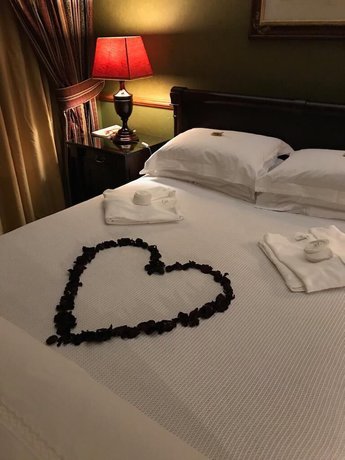 Imagen de la habitación del Hotel Whistletree Manor Boutique. Foto 17