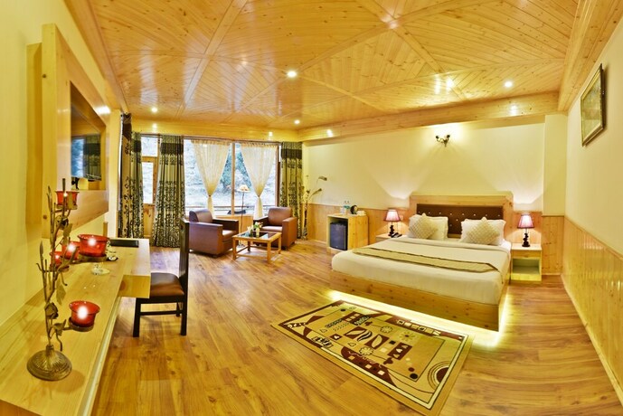 Imagen de la habitación del Hotel Whistling Pines Resorts and Spa. Foto 22