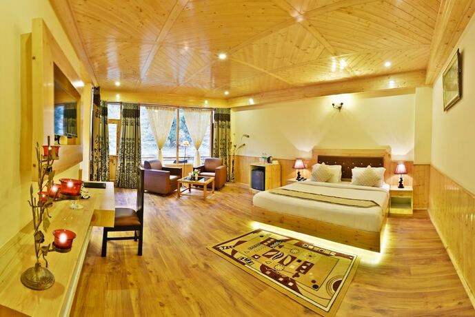 Imagen de la habitación del Hotel Whistling Pines Resorts and Spa. Foto 26