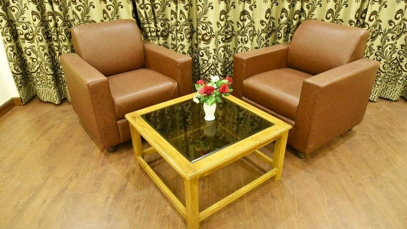 Imagen de la habitación del Hotel Whistling Pines Resorts and Spa. Foto 30