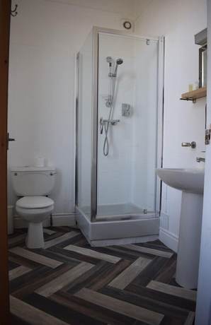 Imagen de la habitación del Hotel Whitburn House. Foto 19