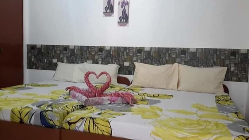 Imagen de la habitación del Hotel White Beach Guest House. Foto 6