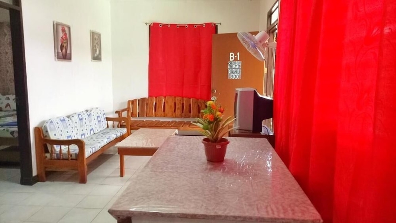 Imagen de la habitación del Hotel White Beach Guest House. Foto 12