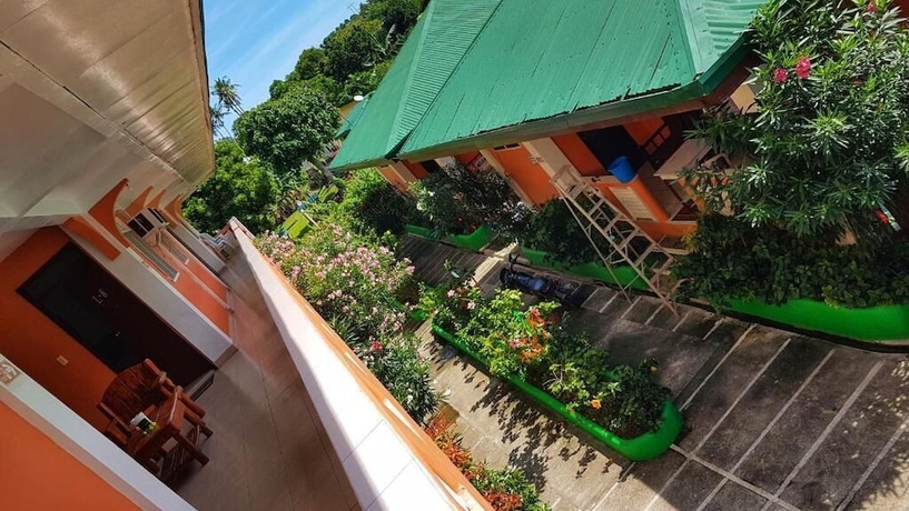 Imagen de la habitación del Hotel White Beach Guest House. Foto 13