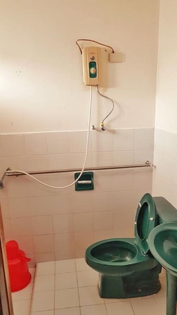 Imagen de la habitación del Hotel White Beach Guest House. Foto 14