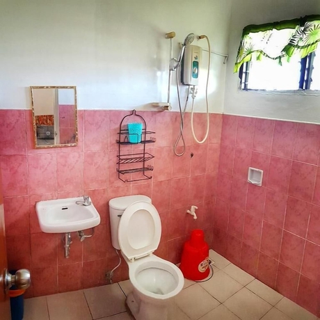 Imagen de la habitación del Hotel White Beach Guest House. Foto 15