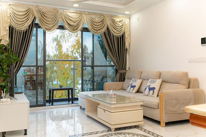 Imagen de la habitación del Hotel White Beach Holiday. Foto 3