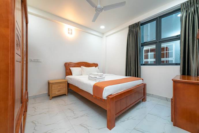 Imagen de la habitación del Hotel White Beach Holiday. Foto 4