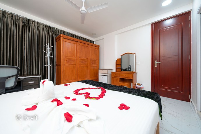 Imagen de la habitación del Hotel White Beach Holiday. Foto 7