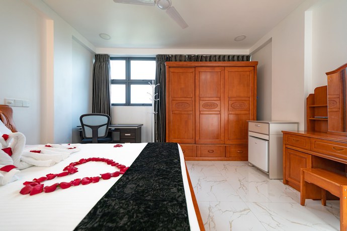 Imagen de la habitación del Hotel White Beach Holiday. Foto 9